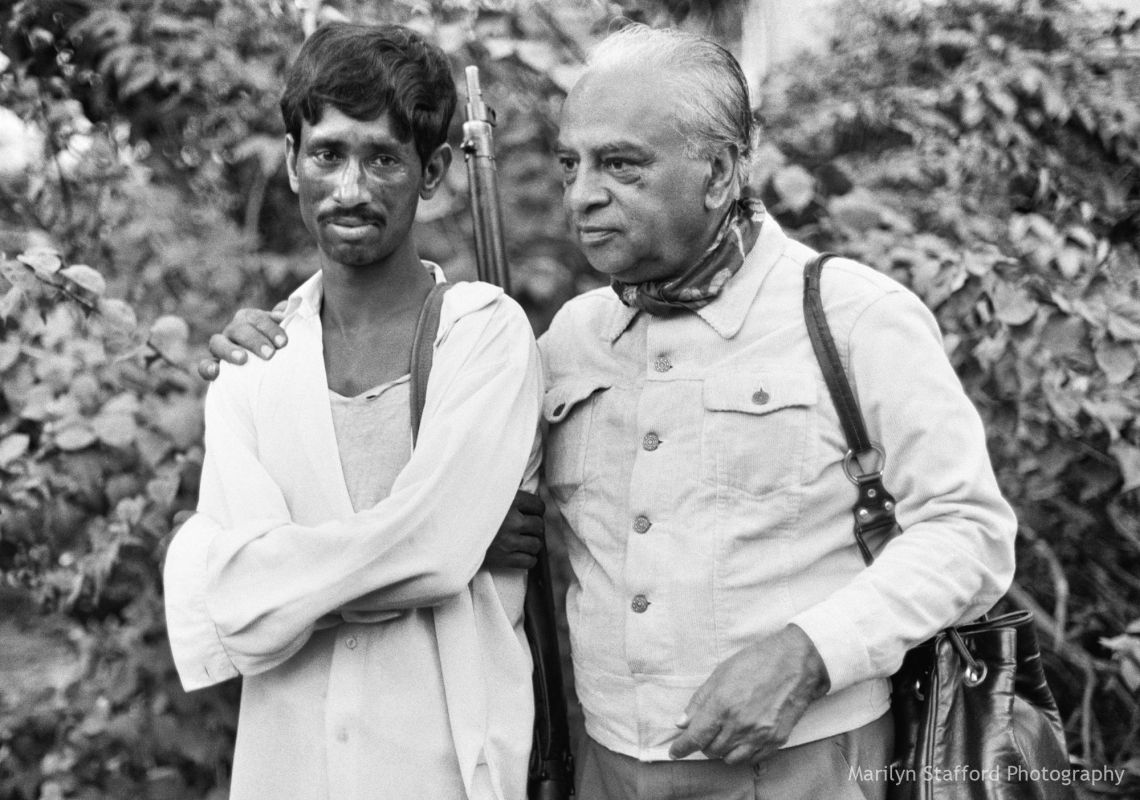 Mulk Raj Anand with a village victim of the Bangladesh Liberation War, Gopalganj District, 1972.