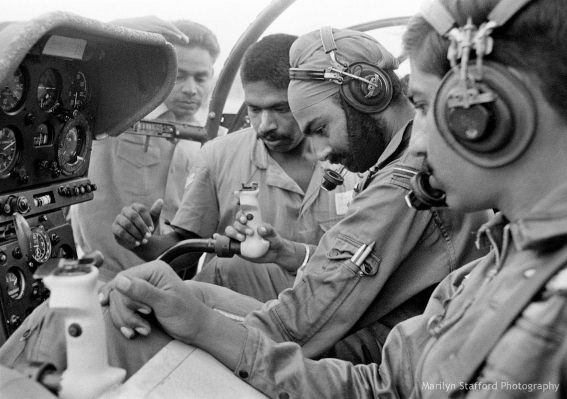 Helicopter crew preparing for flight over war-damaged villages of Bangladesh. Dhaka, 1972.