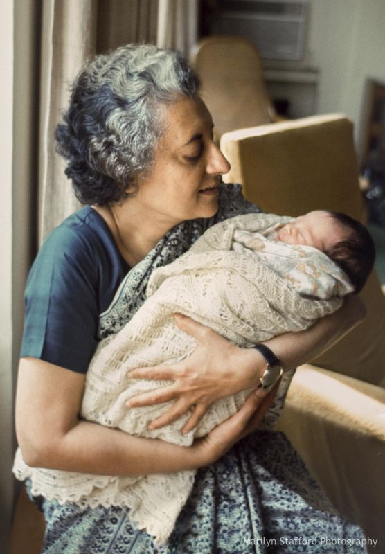 Indira Gandhi, at home with her new grandchild, Priyanka, New Delhi, 1972.